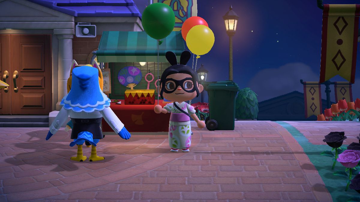 An Animal Crossing character holds a Green Balloon